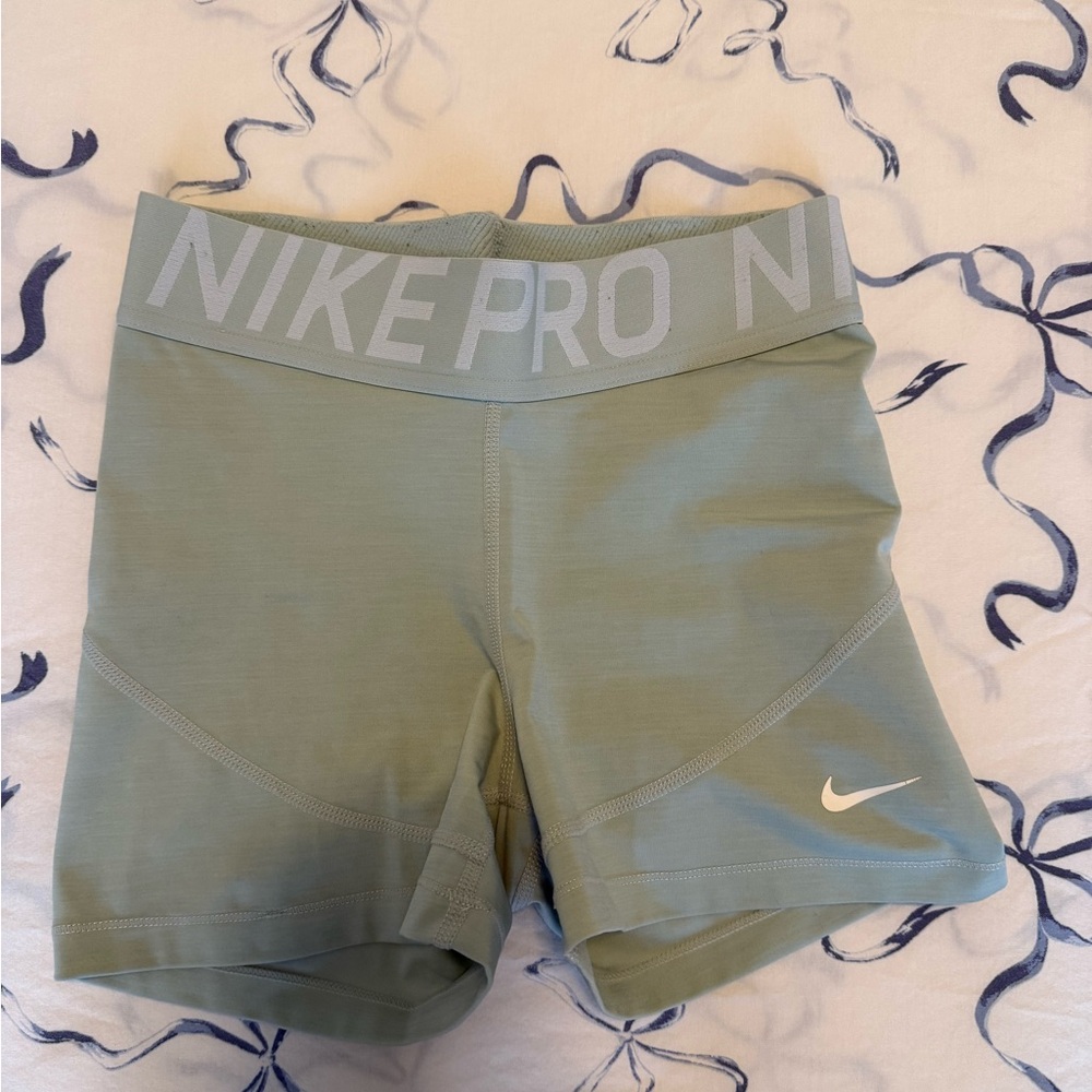 Nike Women's Pro Athletic Shorts in Light Green